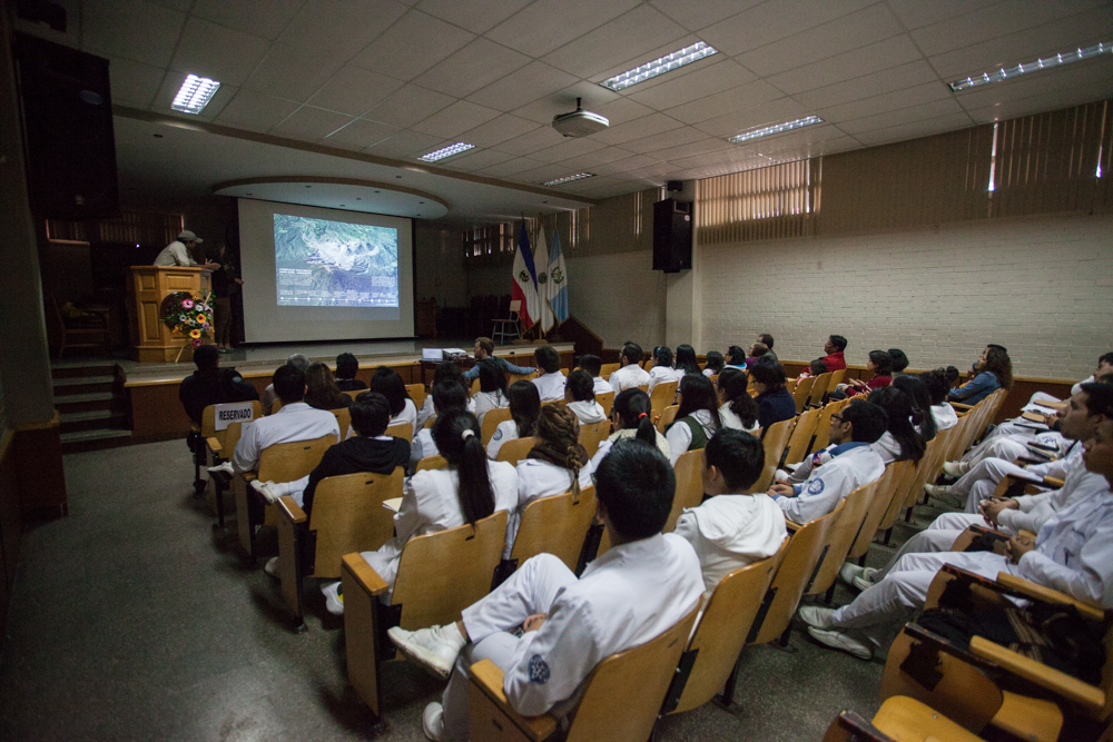 Stephanie, explaining an infographic of the Santa Maria-Santiaguito Volcanic System to a group of students at the San Carlos public university in Xela, Guatemala.